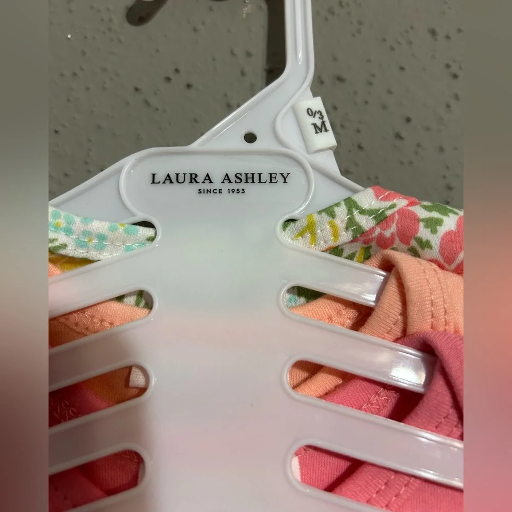 Laura Ashley Floral and Pink Bodysuit Set. (Set of 3 shirts)